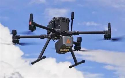 Survey drone with mapping payload in flight.