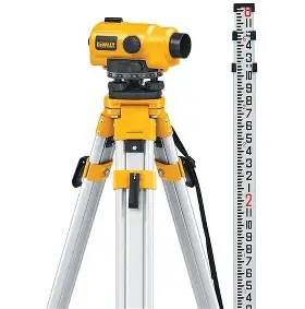 Automatic level on a tripod with levelling staff.