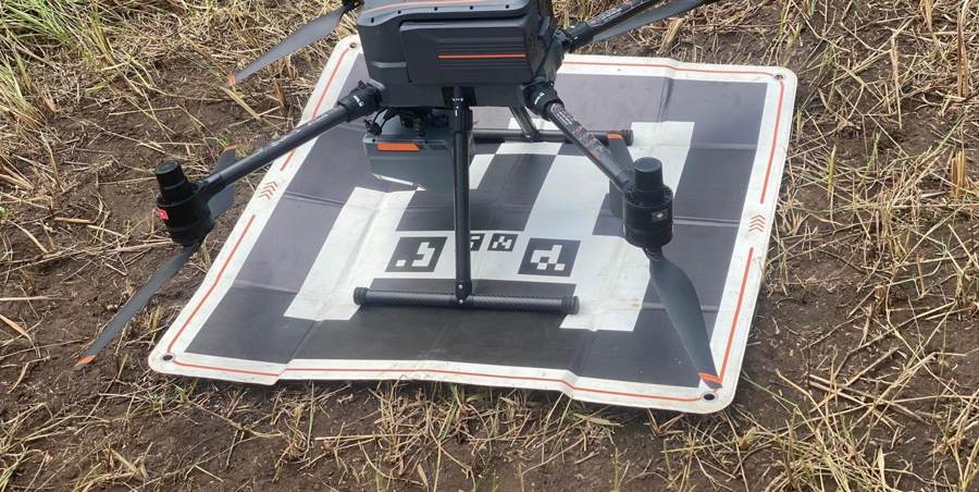 Survey drone on its landing pad before an aerial mapping flight